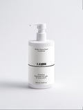 Lamidibeauty Keratin Volumen-Boost Conditioner in einer Flasche mit cremiger Textur, für kräftiges, glänzendes Haar.